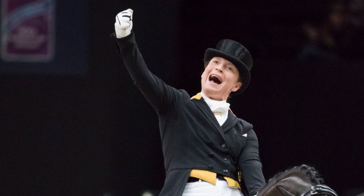 Equestrian Dressage Champion Isabell Werth celebrating 